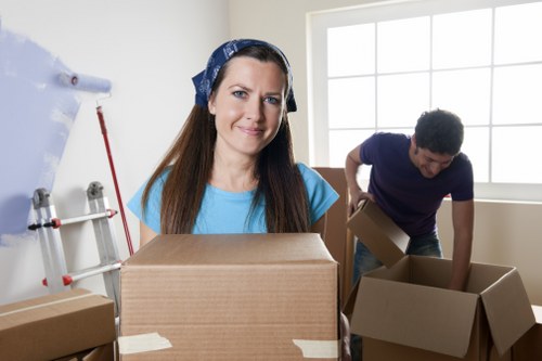 Packed office boxes and equipment ready for relocation in Hackney