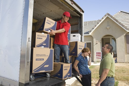 Packed boxes being loaded into a removals van