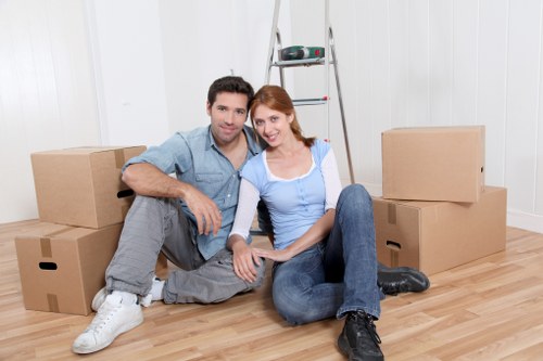 Hackney removals staff reviewing insurance and safety procedures