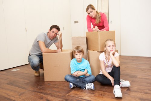 Packed boxes and furniture ready for a home move in Hackney