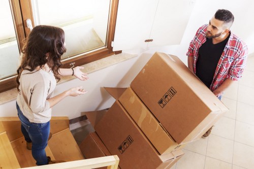 Packed boxes and household items ready for transport in Hackney